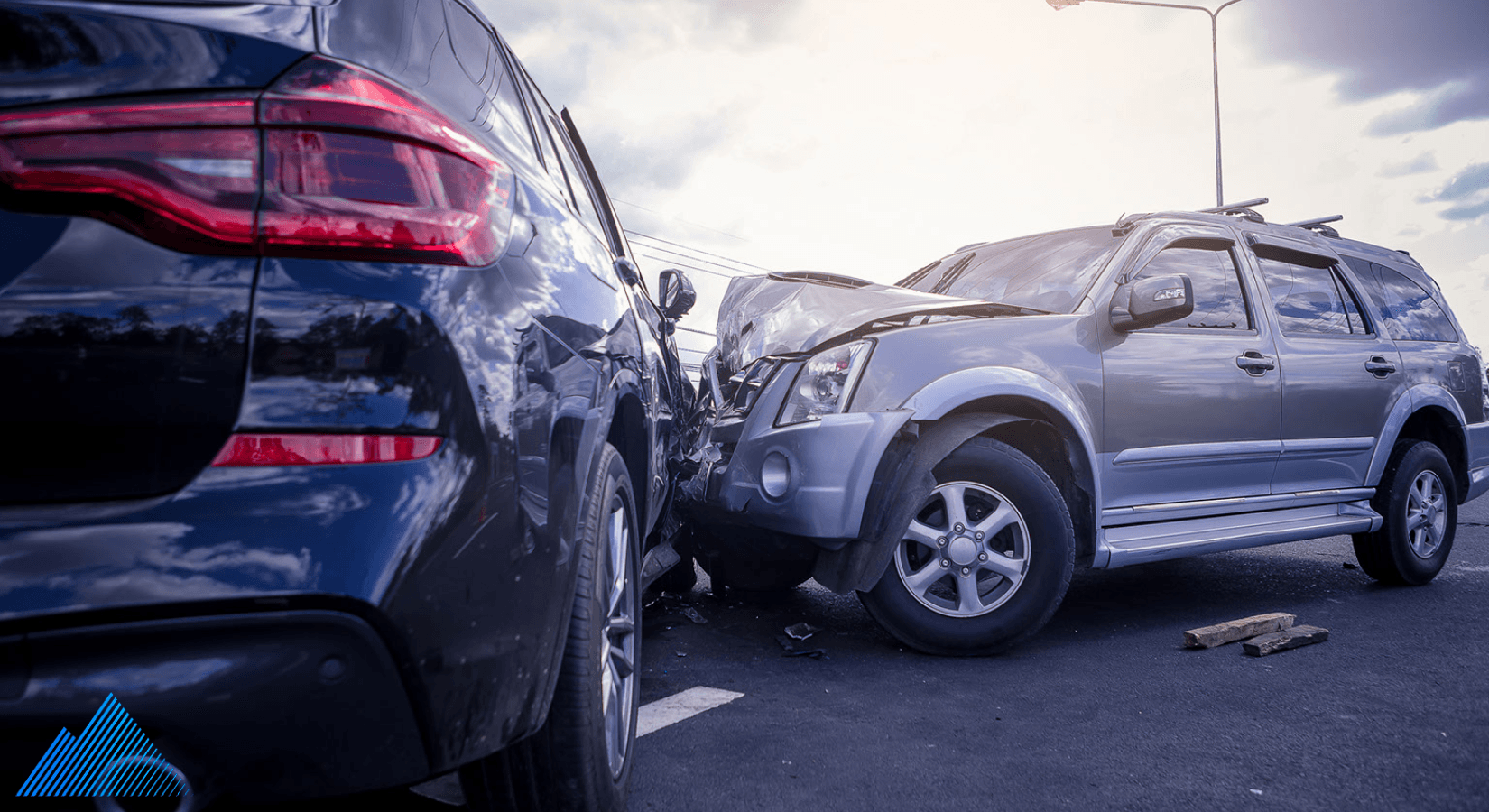 Two luxury cars in a minor accident