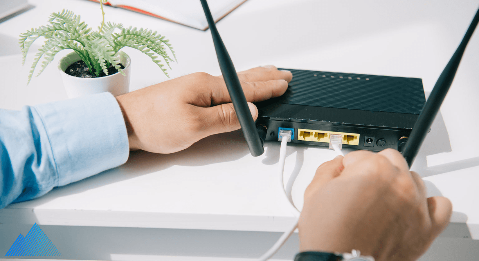 Person setting up a wireless router