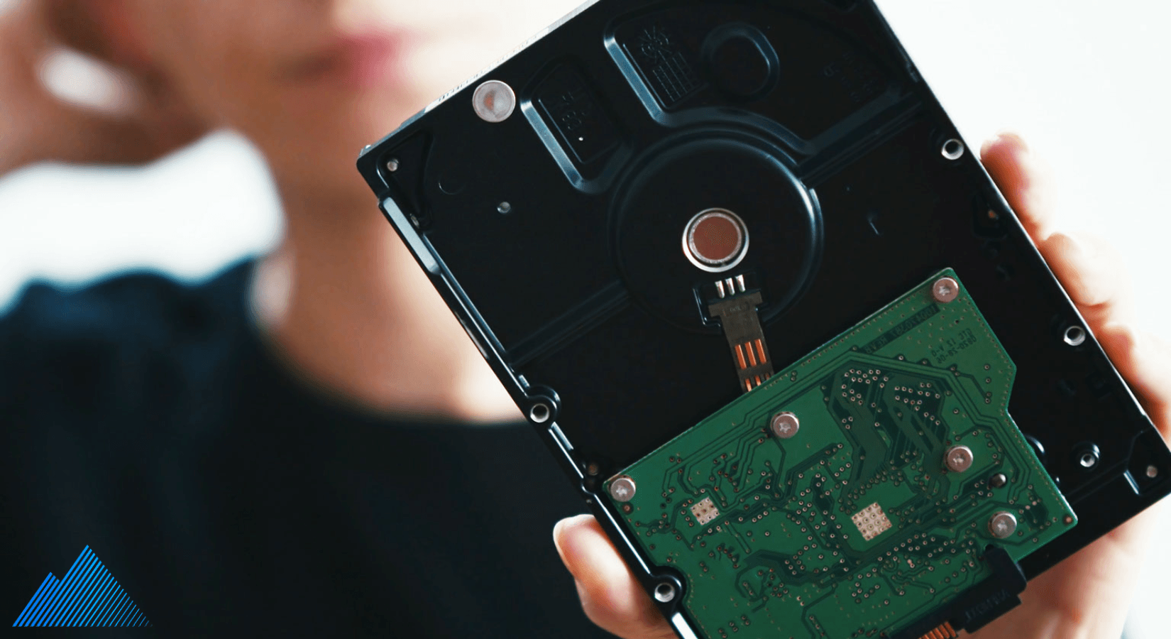 Person holding a hard drive