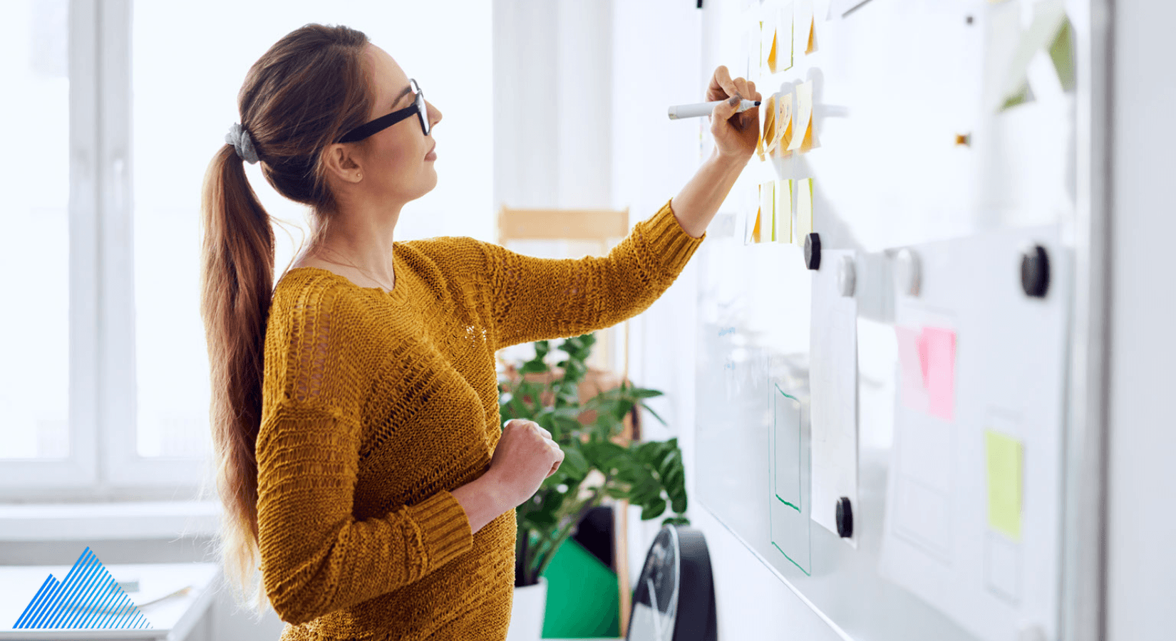 Woman using a planning whiteboard