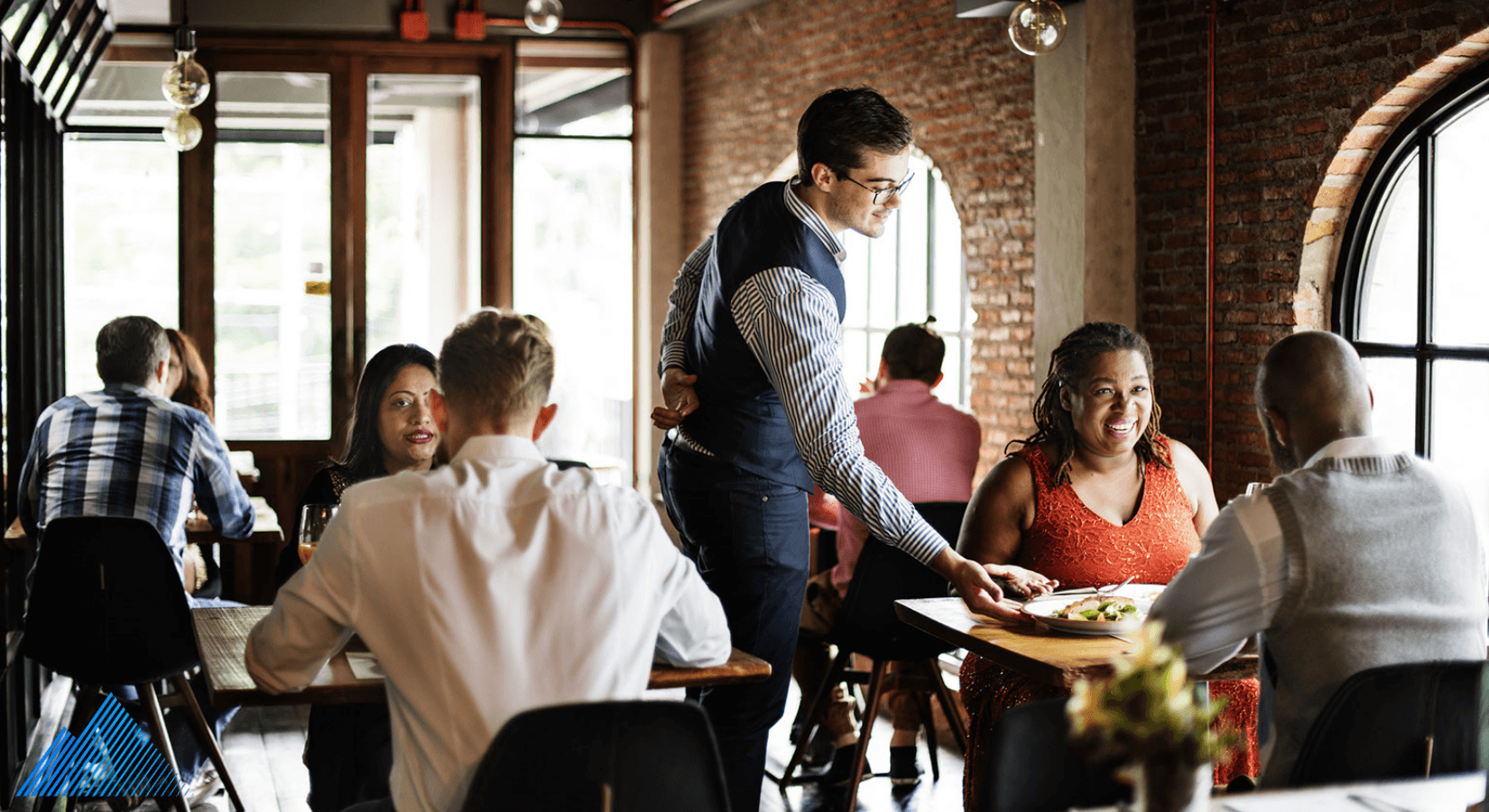 A server waiting tables in a restaurant