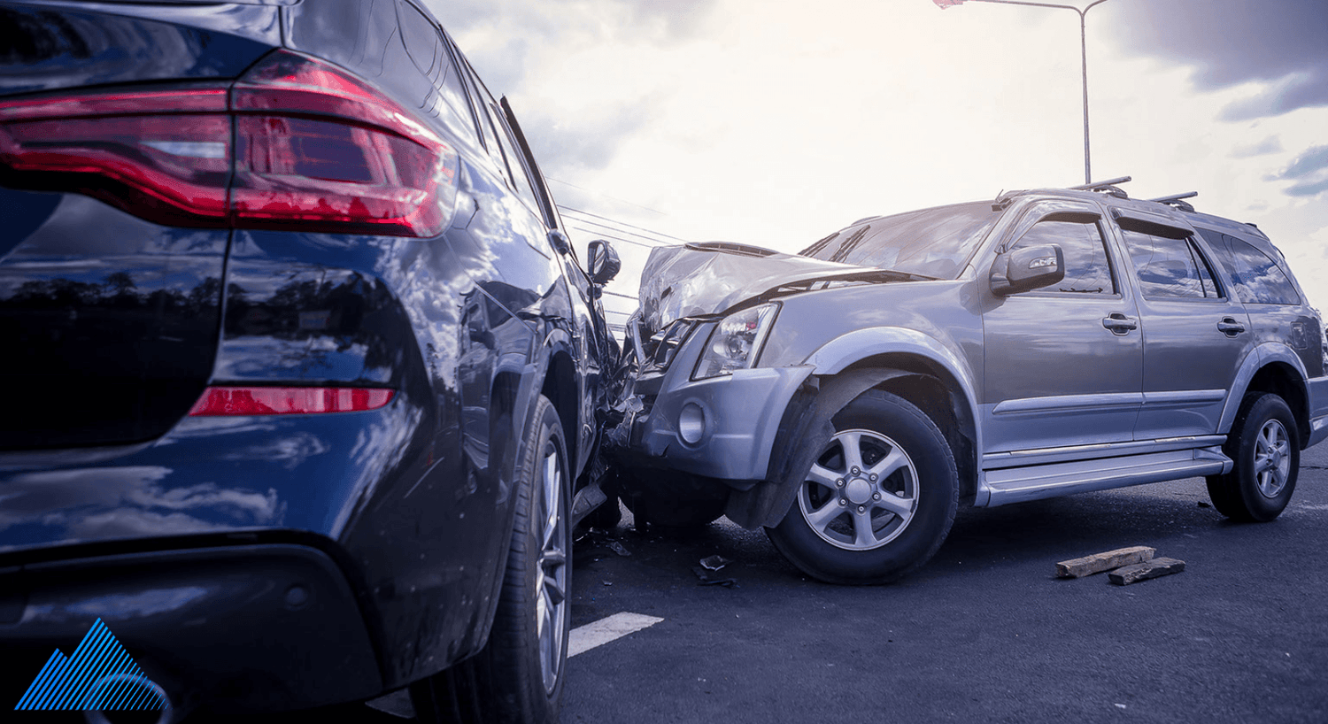 Two luxury cars in a minor accident