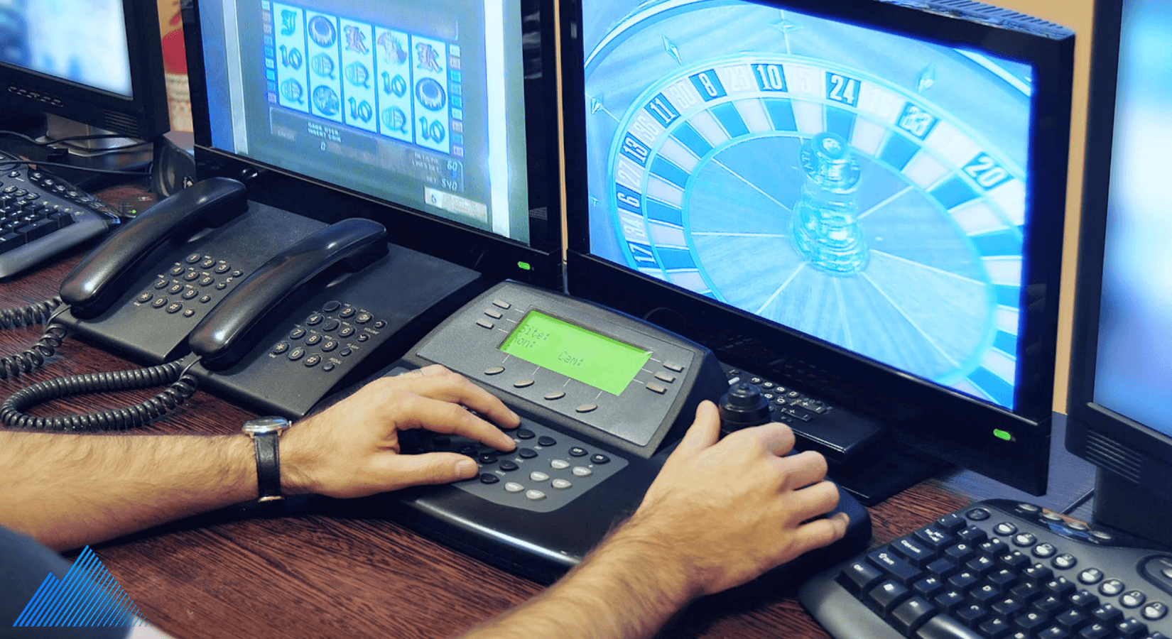 Person monitoring a casino security feed