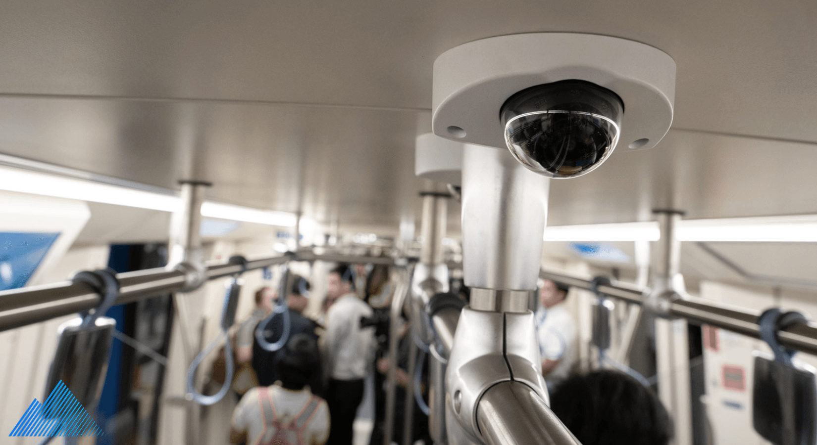 Dome camera mounted on ceiling of a subway