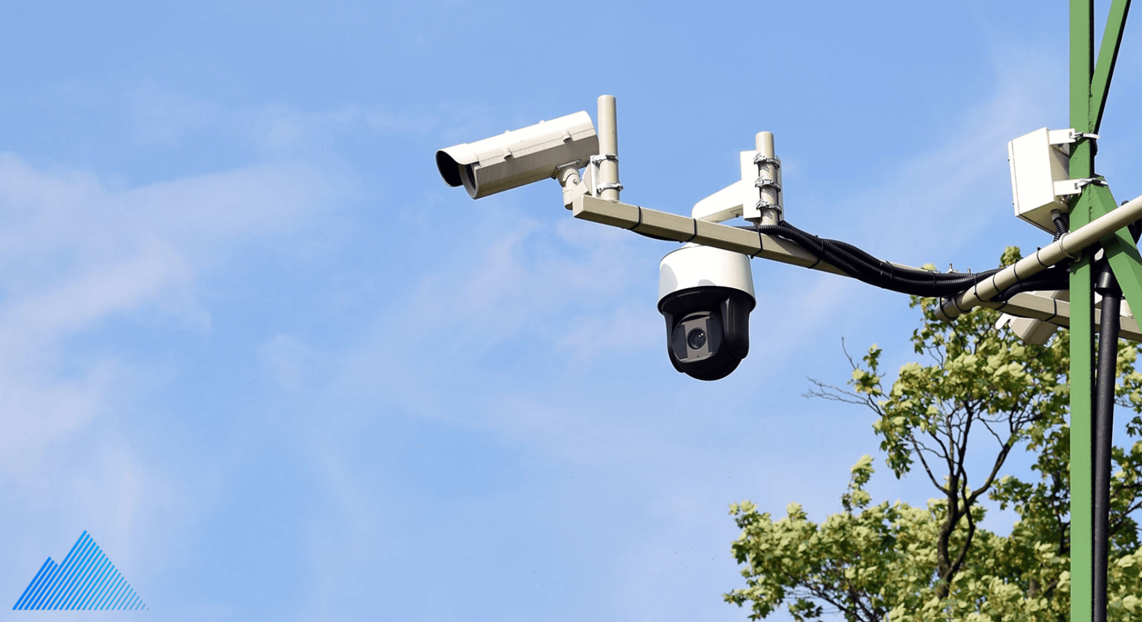 PTZ camera and security camera mounted on a pole outside